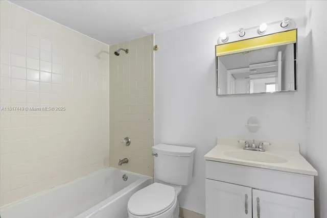 a kitchen with a stove and a microwave