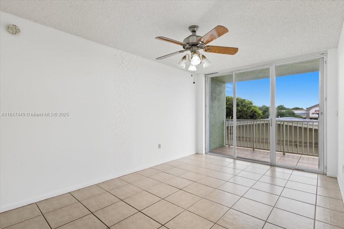 616 Northwest 26th Avenue, Unit 210 Miami, FL 33125 - Photo 2 of 23 a view of a livingroom with a fan