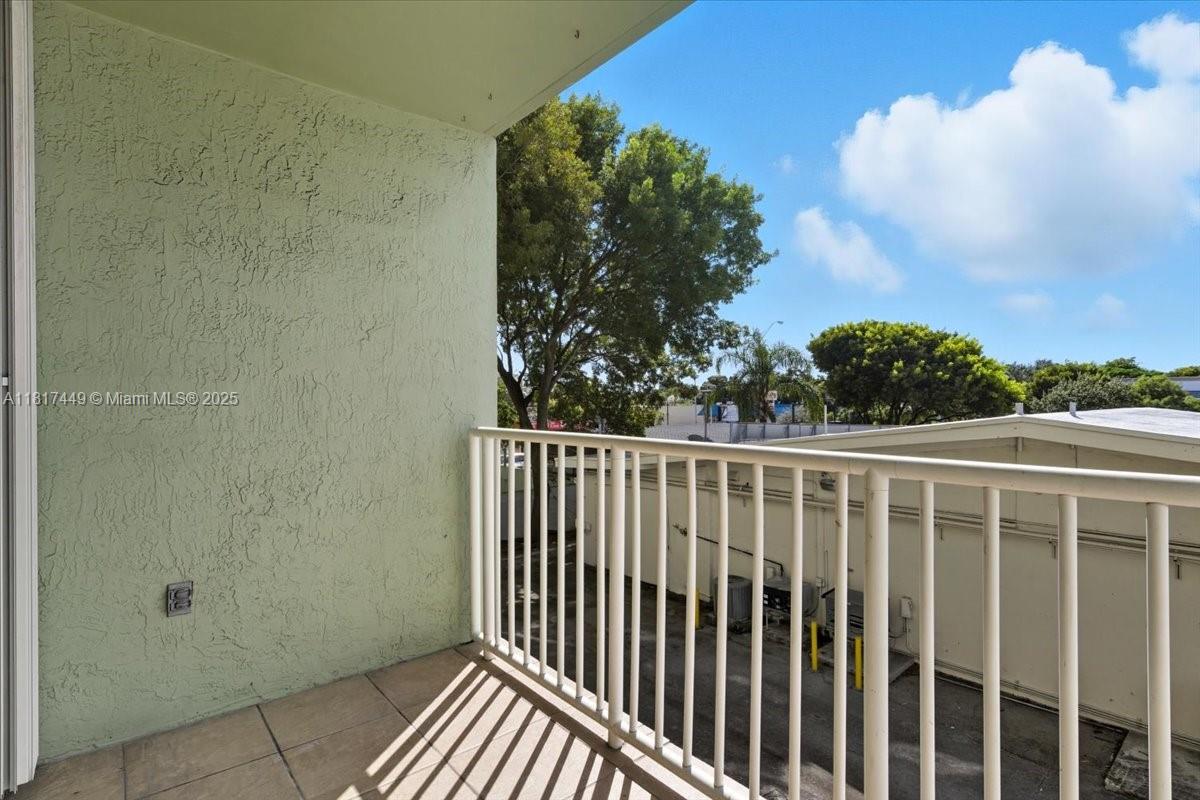 616 Northwest 26th Avenue, Unit 210 Miami, FL 33125 - Photo 21 of 23 a view of a balcony