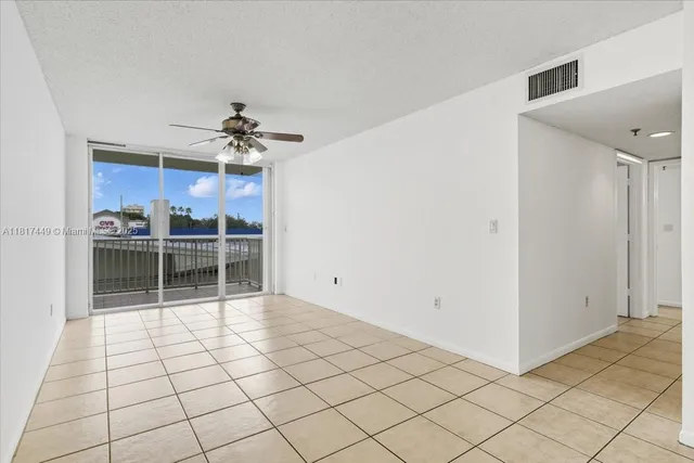 a view of a livingroom with a furniture and chandelier
