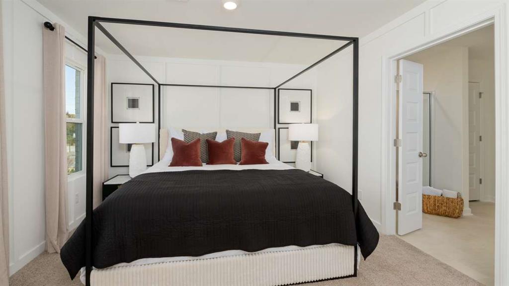 717 Alburgh Alley Mableton, GA 30126 - Photo 32 of 38 a bedroom with a bed and a table