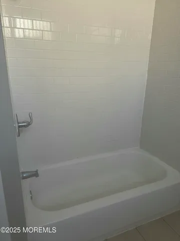 a close up of a bathtub
