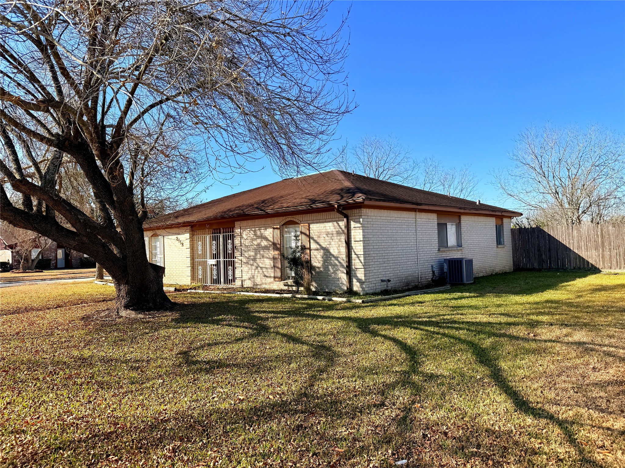 2112 Rose Road Pearland, TX 77581 - Photo 2 of 15 a view of a house with a yard