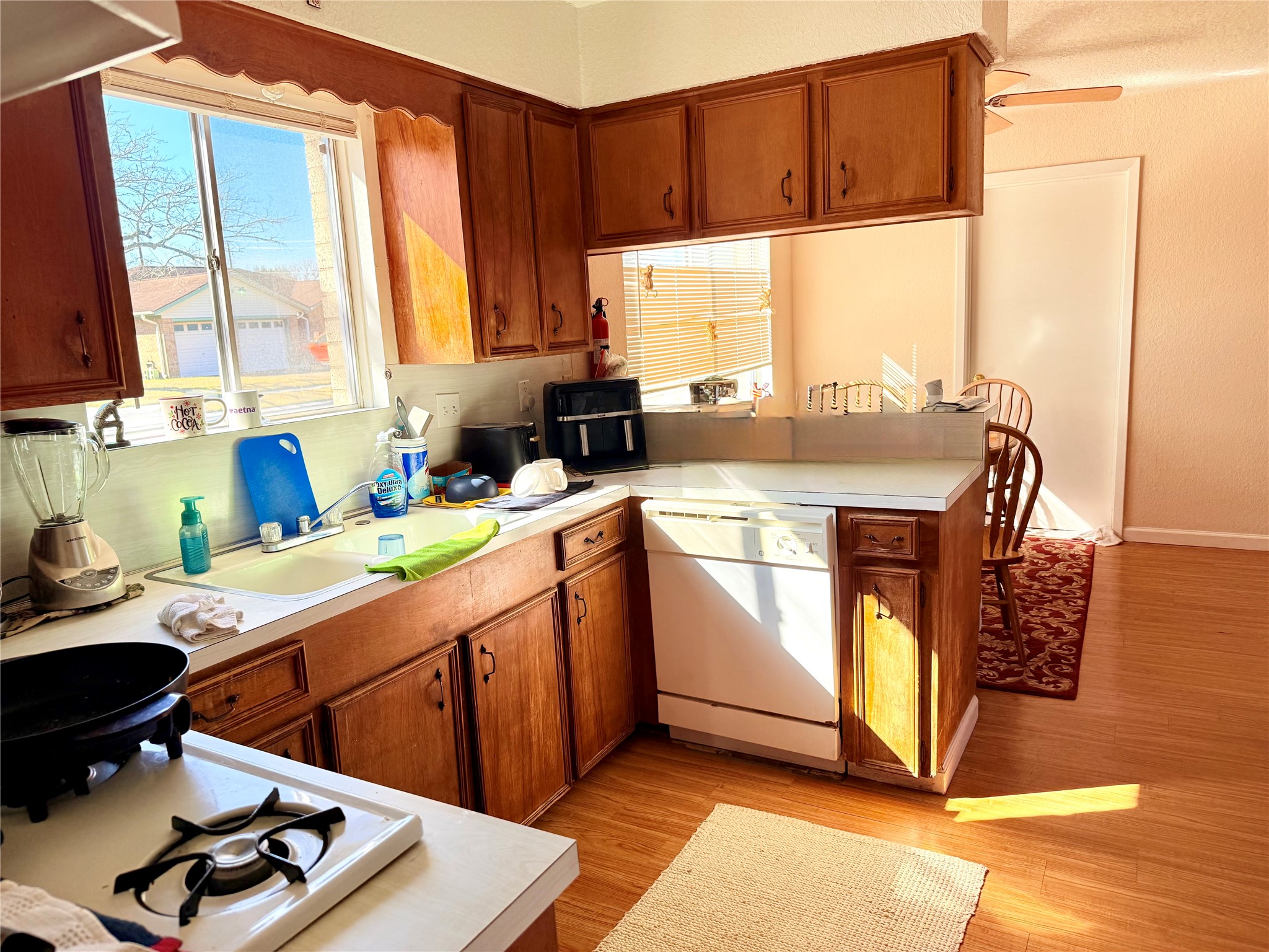 2112 Rose Road Pearland, TX 77581 - Photo 6 of 17 a kitchen with a sink cabinets and window