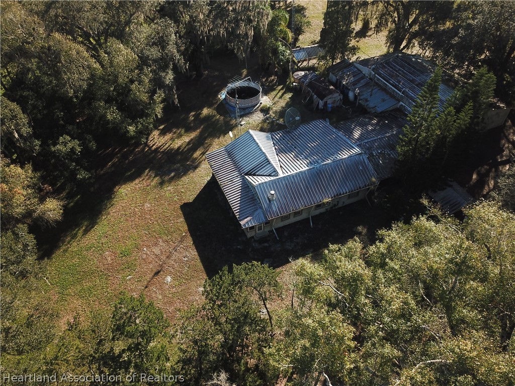a view of yard along with trees