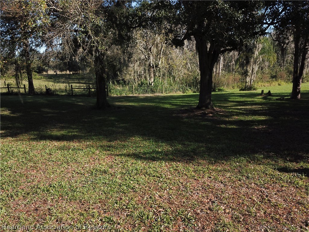 6211 Van Simmons Road Wauchula, FL 33873 - Photo 8 of 8 a view of backyard with green space