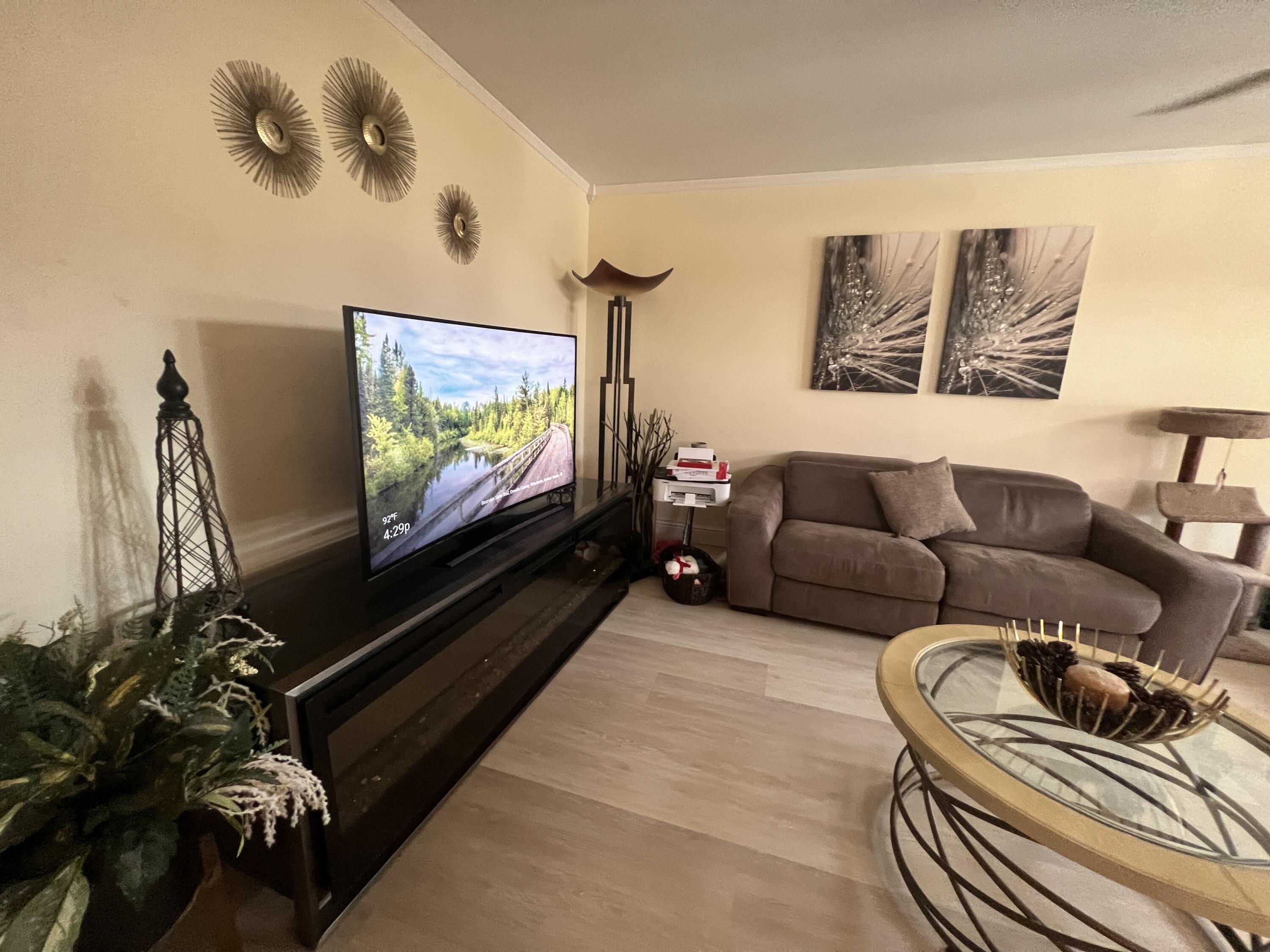 652 Flanders North Delray Beach, FL 33484 - Photo 13 of 27 a living room with furniture and a flat screen tv