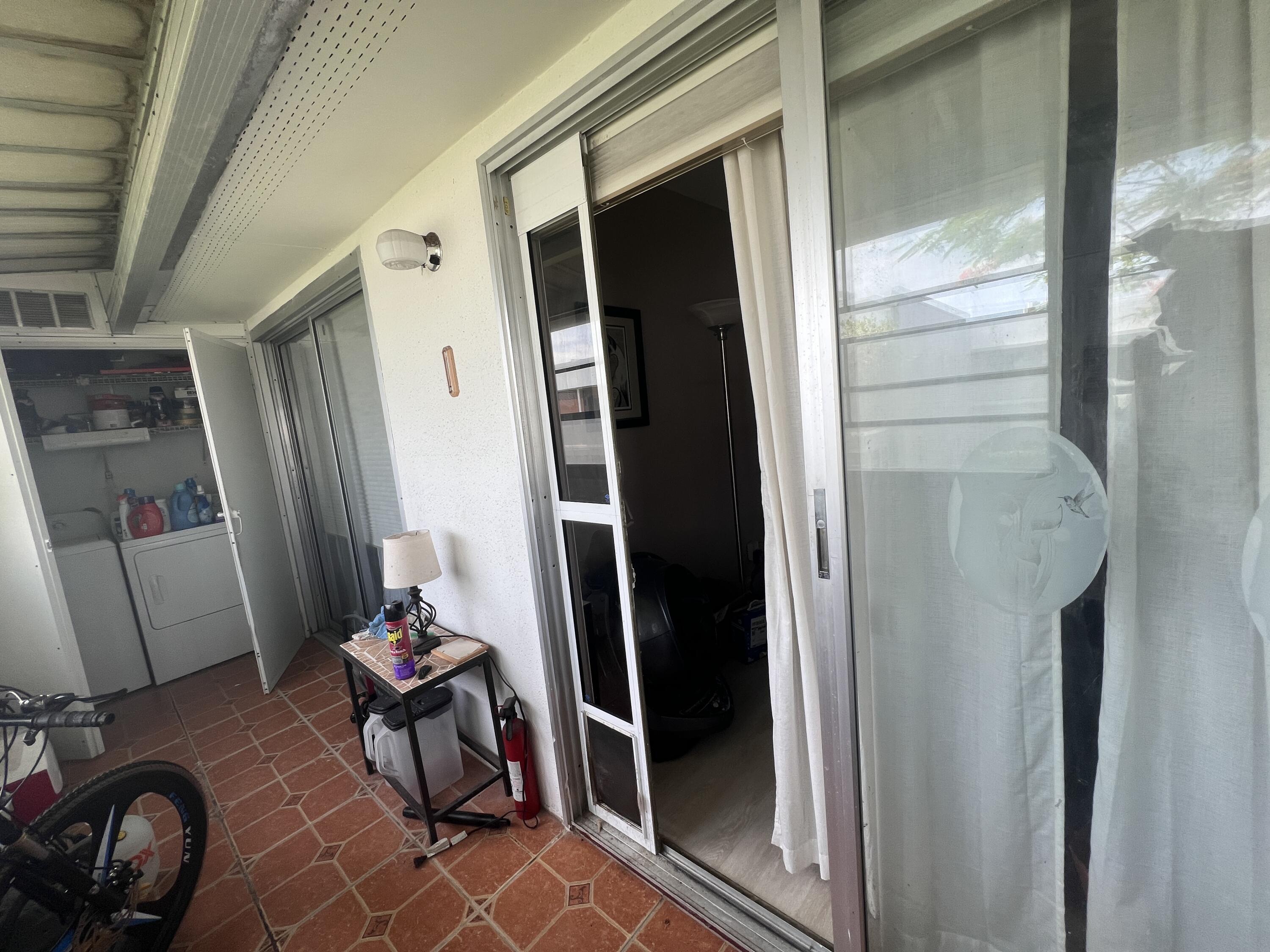 652 Flanders North Delray Beach, FL 33484 - Photo 24 of 27 a bathroom with a sink and a mirror