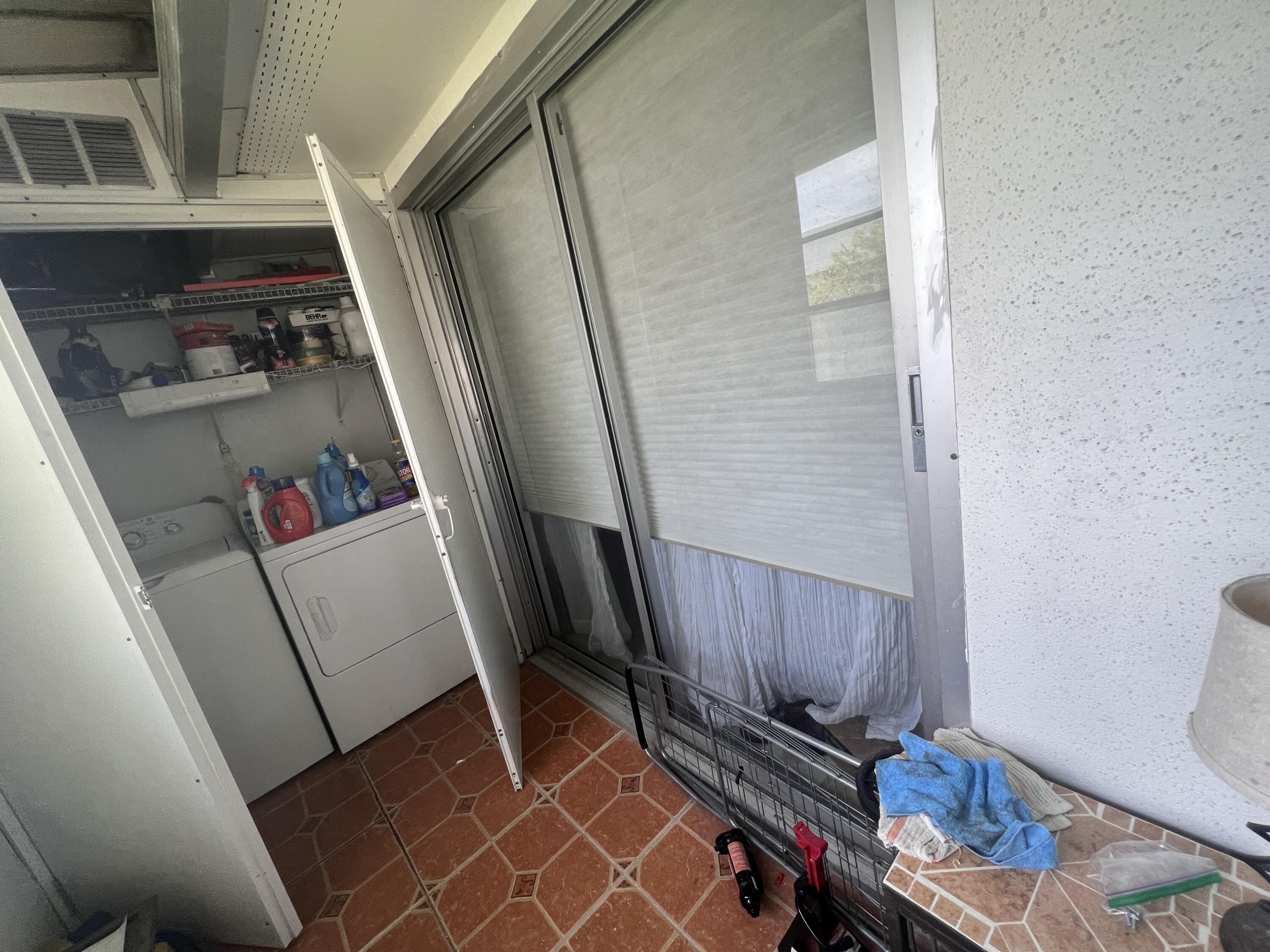 652 Flanders North Delray Beach, FL 33484 - Photo 25 of 27 a view of storage and utility room