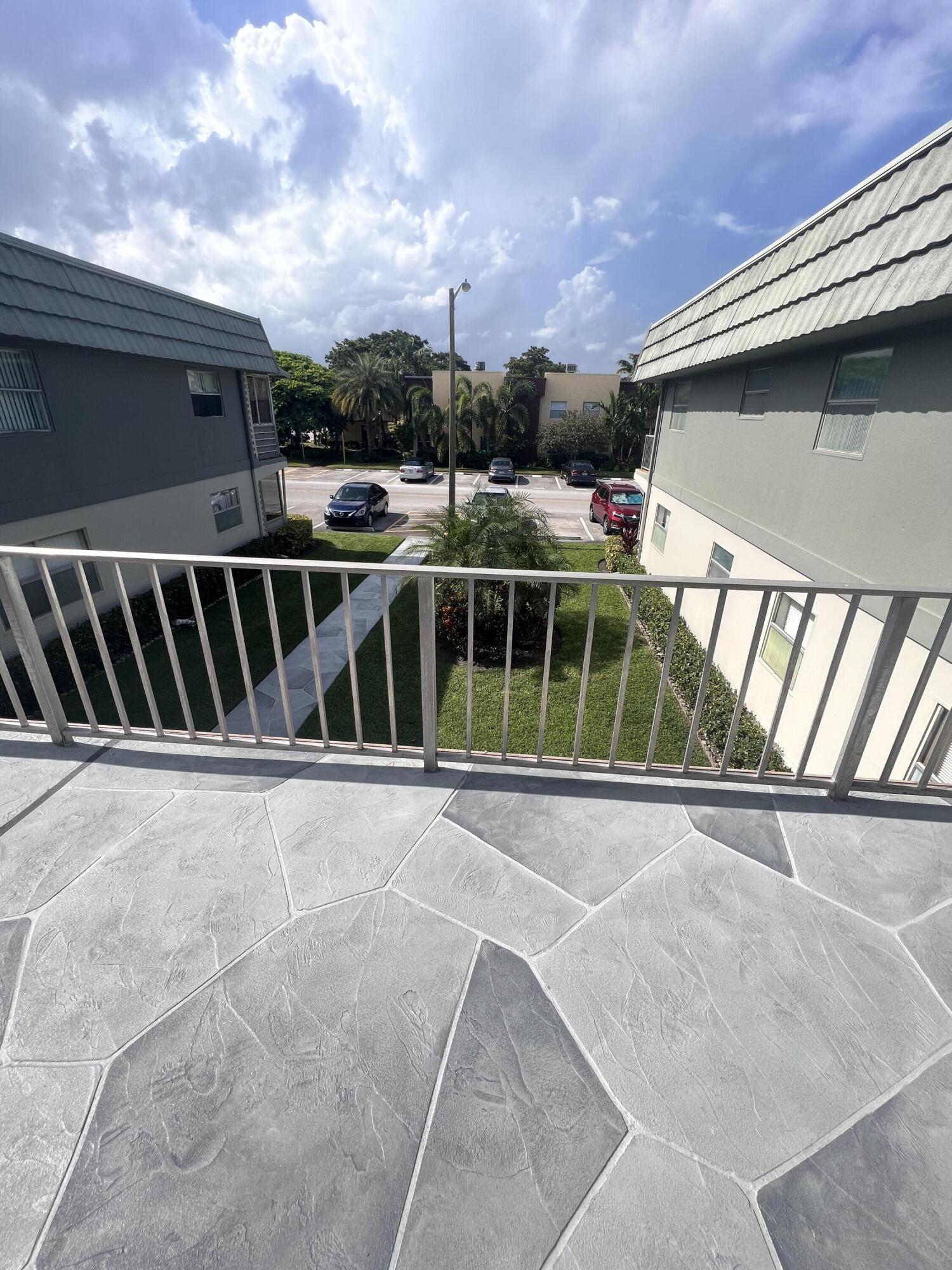 652 Flanders North Delray Beach, FL 33484 - Photo 4 of 27 a view of a balcony