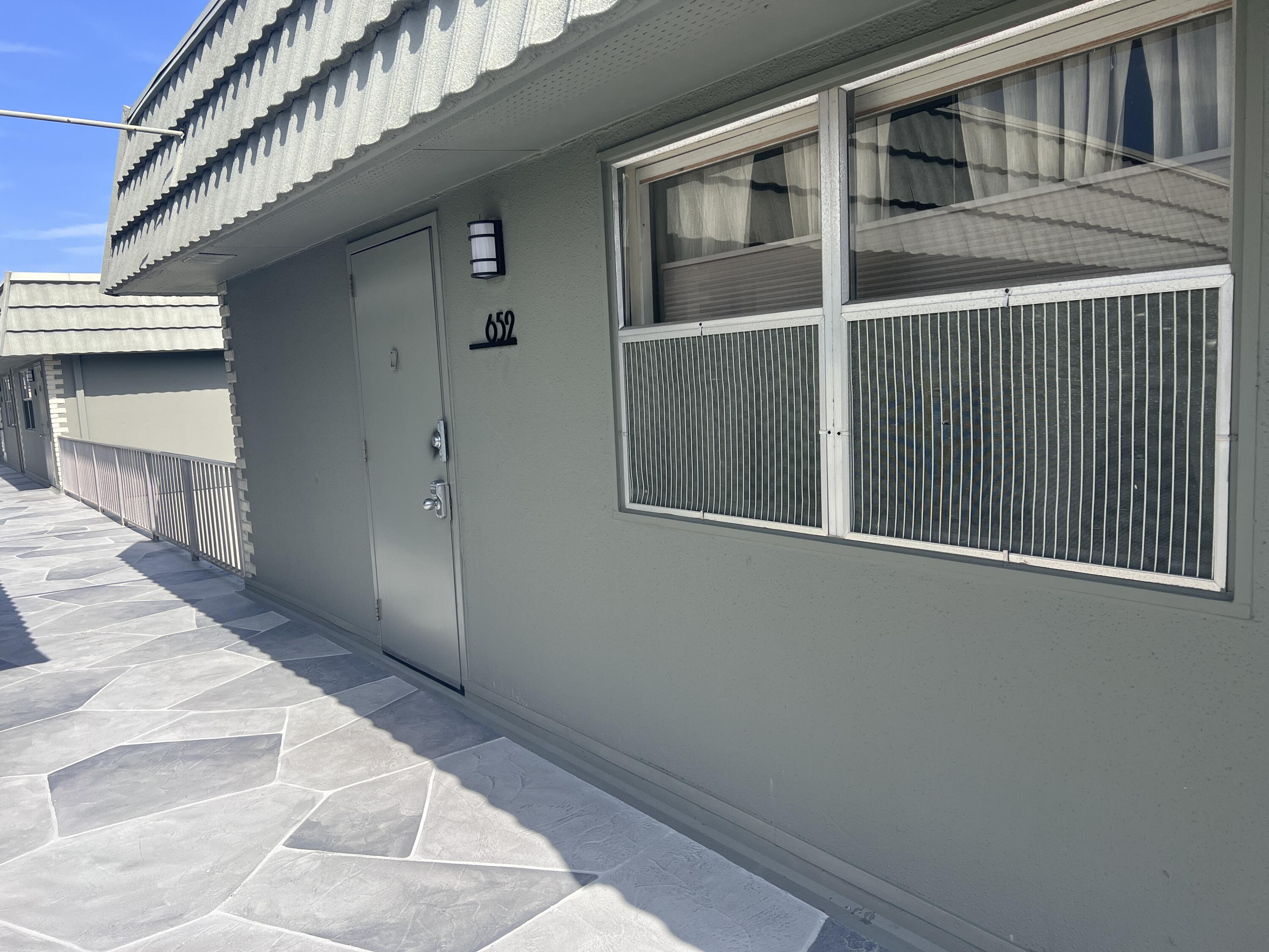 652 Flanders North Delray Beach, FL 33484 - Photo 5 of 27 a view of an entrance