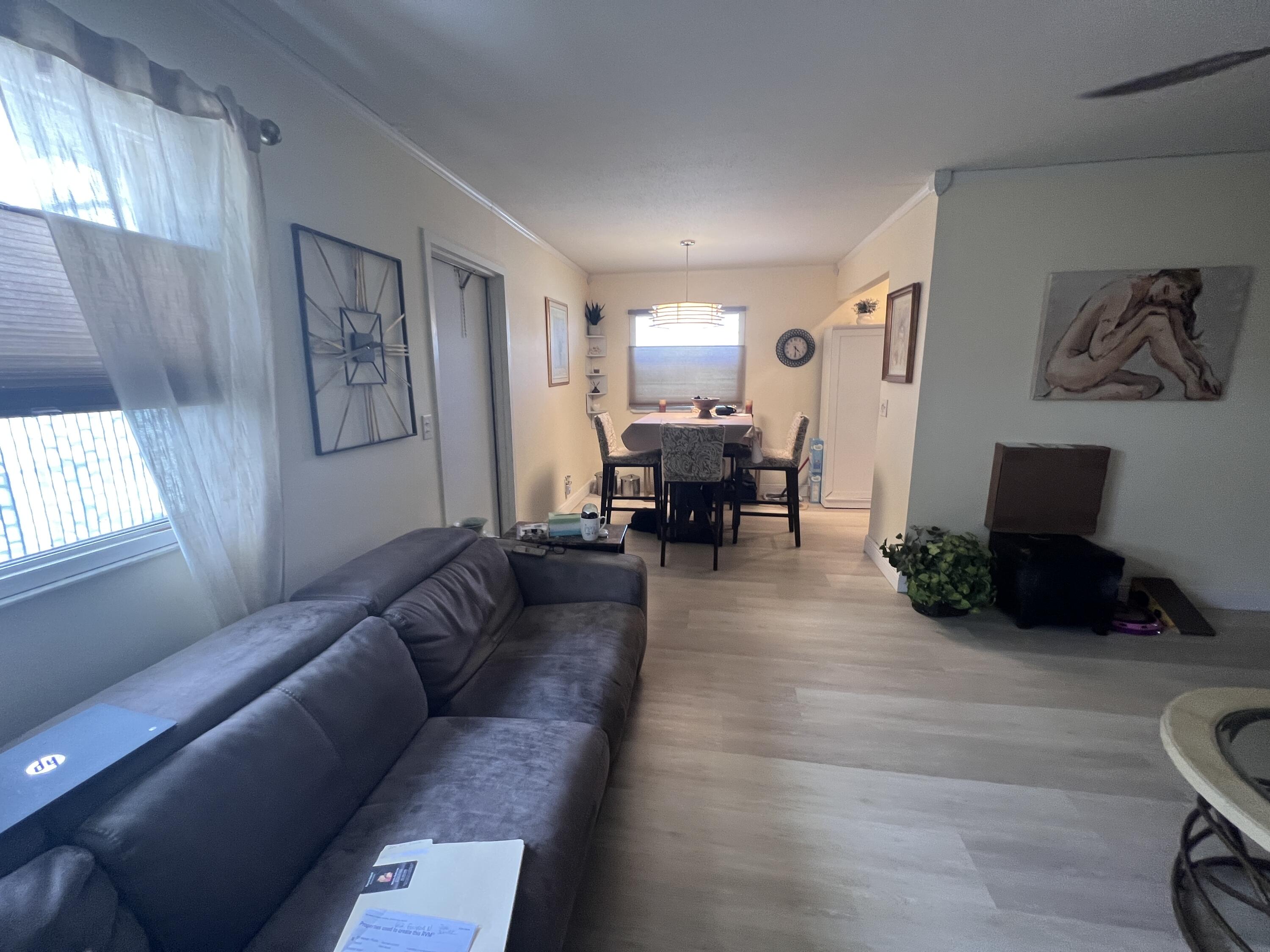652 Flanders North Delray Beach, FL 33484 - Photo 9 of 27 a living room with furniture and wooden floor