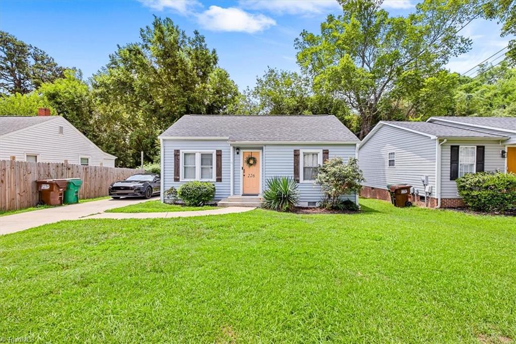 226 Friendly Avenue High Point, NC 27260 - Photo 6 of 38 A spacious front lawn frames this High Point NC bungalow, part of a generous 0.18 acre lot in Milbourne Heights.