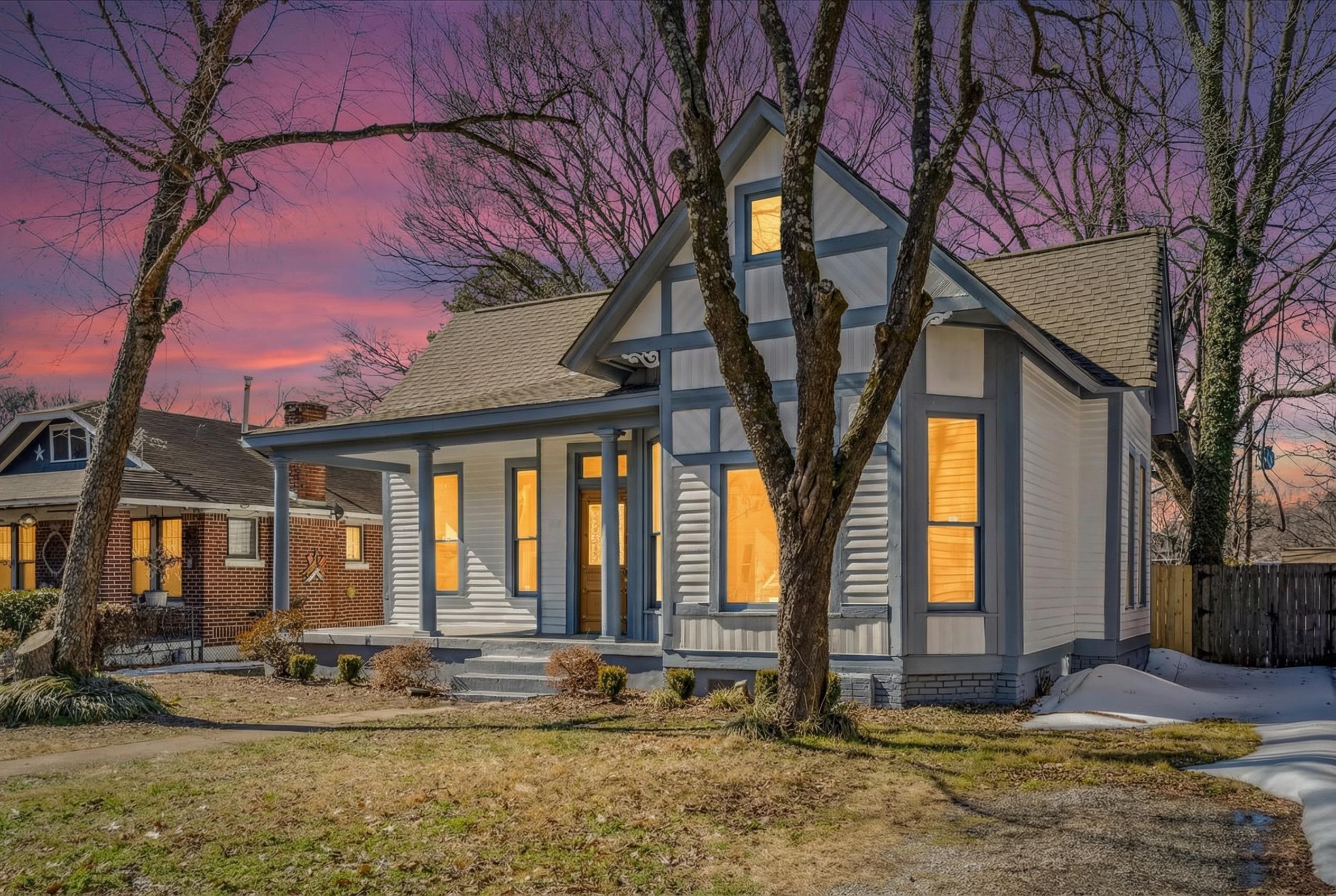 1069 Blythe Street Memphis, TN 38104 - Photo 2 of 24 View of front of home with a porch and roof with shingles