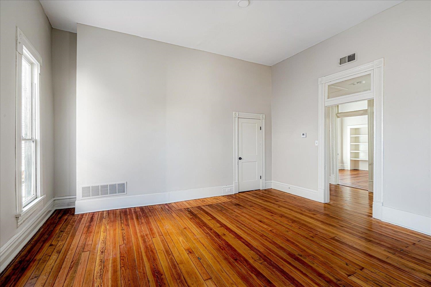 1069 Blythe Street Memphis, TN 38104 - Photo 21 of 24 Spare room with hardwood / wood-style flooring and baseboards