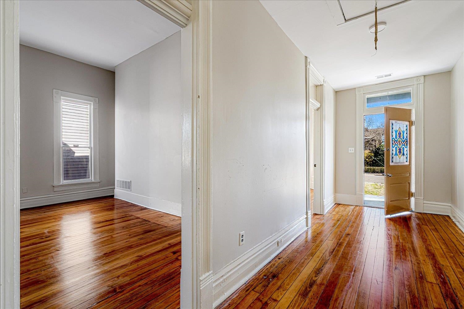 1069 Blythe Street Memphis, TN 38104 - Photo 22 of 24 Corridor with hardwood / wood-style flooring and baseboards