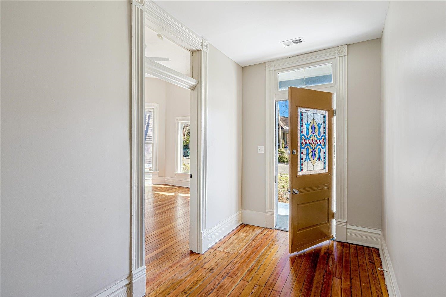 1069 Blythe Street Memphis, TN 38104 - Photo 3 of 24 Foyer entrance featuring light wood-style flooring and baseboards