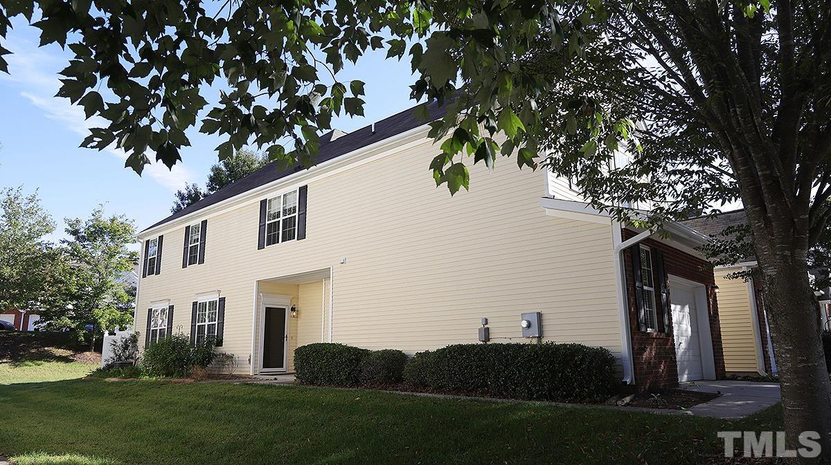 2615 Forest Shadows Lane Raleigh, NC 27614 - Photo 2 of 4 a view of a white house with a yard