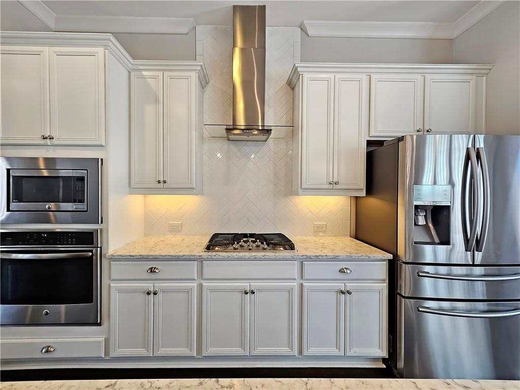 2142 Coventry Drive Brookhaven, GA 30319 - Photo 14 of 52 a kitchen with appliances and cabinets