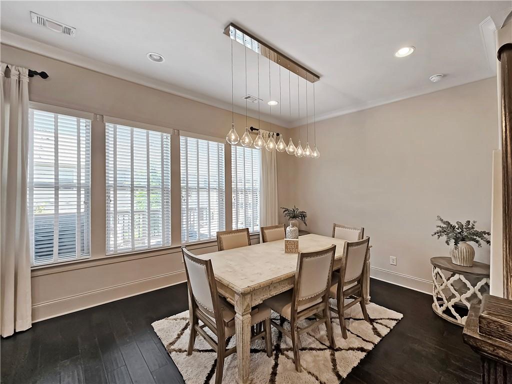 2142 Coventry Drive Brookhaven, GA 30319 - Photo 20 of 52 a view of a dining room with furniture window and wooden floor