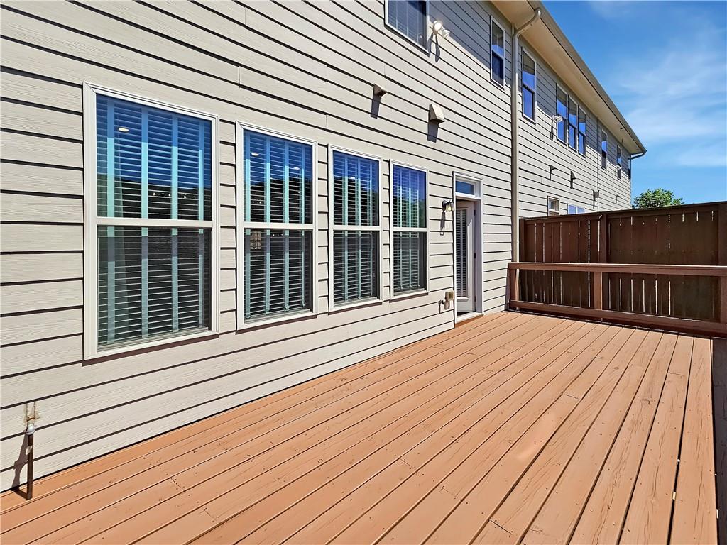 2142 Coventry Drive Brookhaven, GA 30319 - Photo 24 of 52 a view of a house with a roof deck