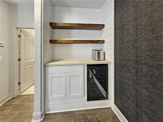 a bathroom with a sink a toilet a mirror and vanity