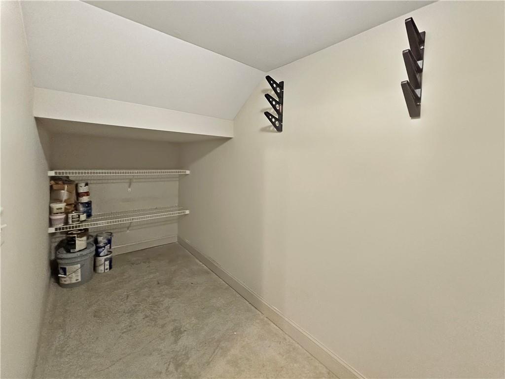 2142 Coventry Drive Brookhaven, GA 30319 - Photo 47 of 52 a view of walk in closet with clothes and shoes