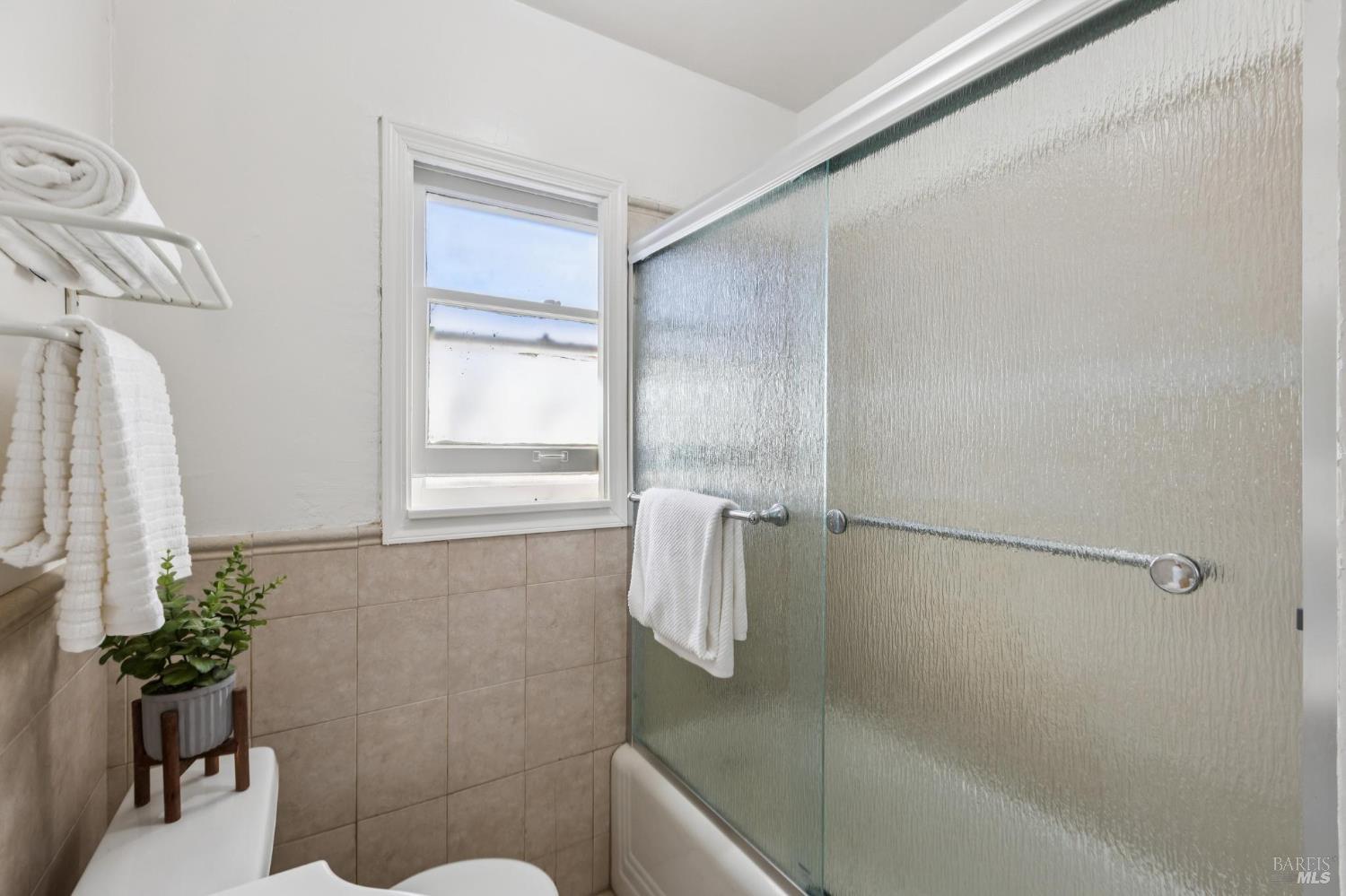 539 Randolph Street Napa, CA 94559 - Photo 26 of 35 a bathroom with a shower and a toilet