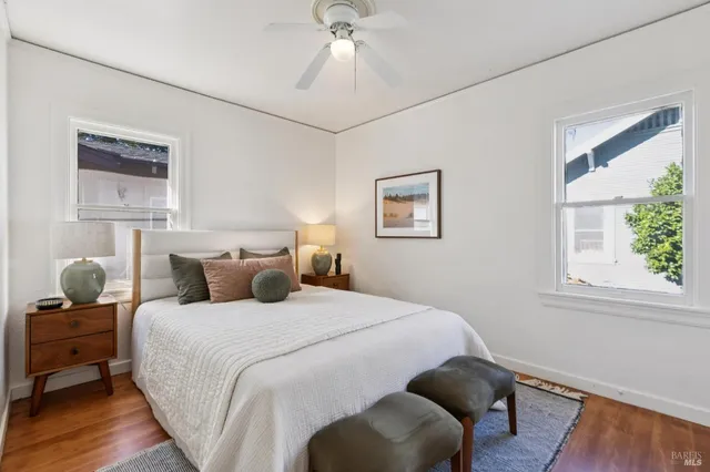 a bedroom with bed and window