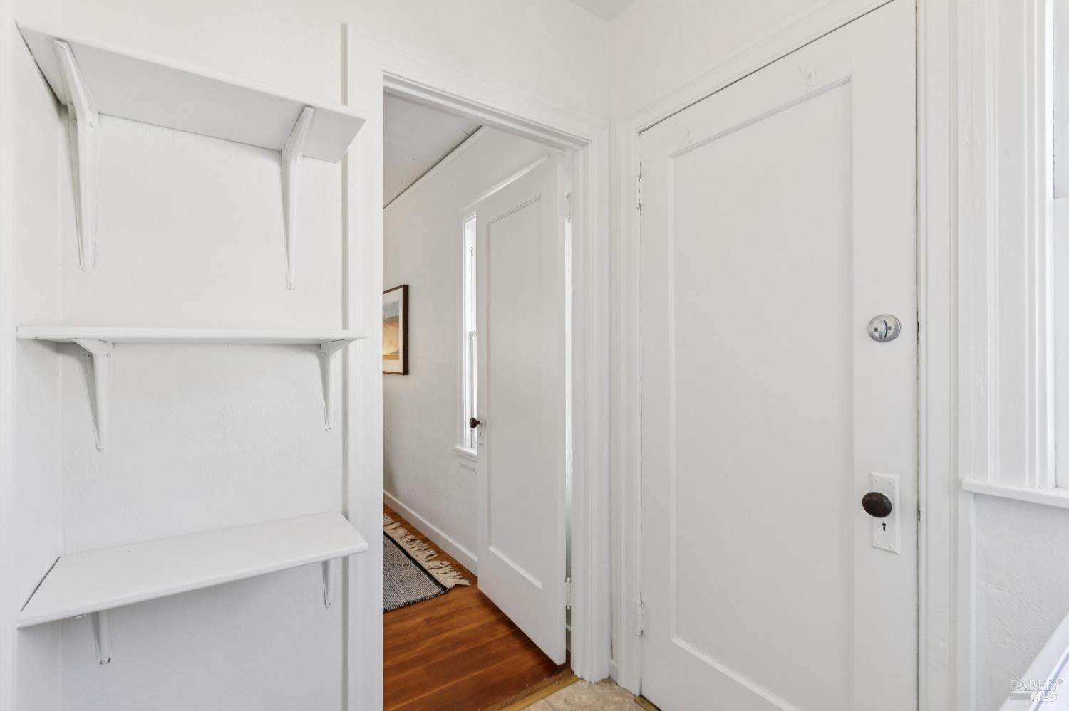 539 Randolph Street Napa, CA 94559 - Photo 31 of 35 a view of a hallway with wooden floor and entryway
