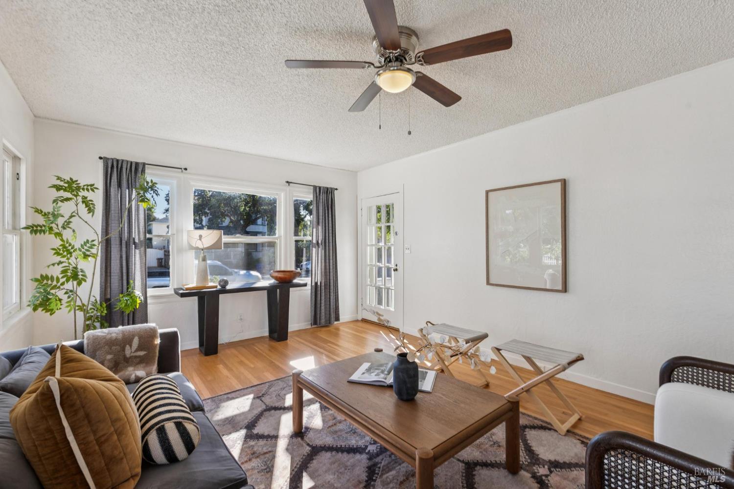 539 Randolph Street Napa, CA 94559 - Photo 10 of 35 a living room with furniture and a large window