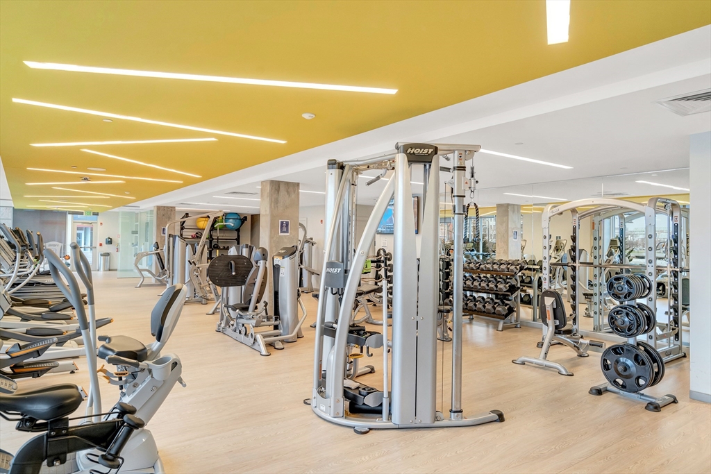 45 Lewis Street, Unit 406 Boston, MA 02128 - Photo 20 of 26 a view of a room with gym equipment