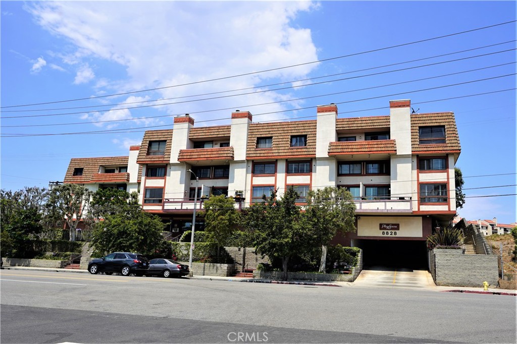 8828 Pershing Drive, Unit 203 Playa del Rey, CA 90293 - Photo 2 of 34 a view of a building with street
