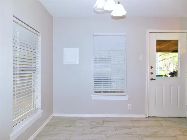 a view of an entryway with a window