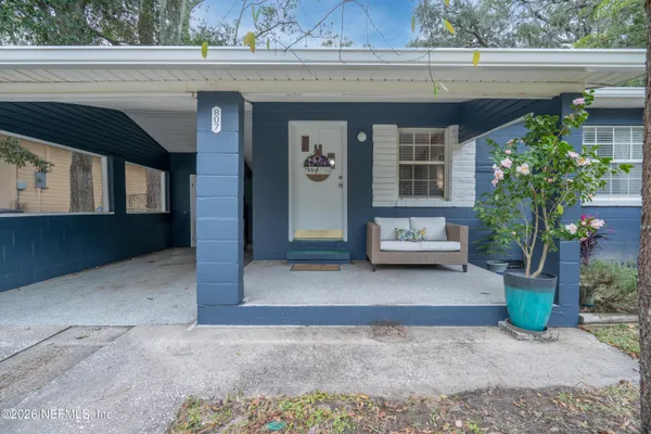 front view of a house with a yard