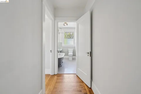 a view of a bathroom from the hallway