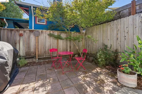a view of outdoor space with garden and sitting area