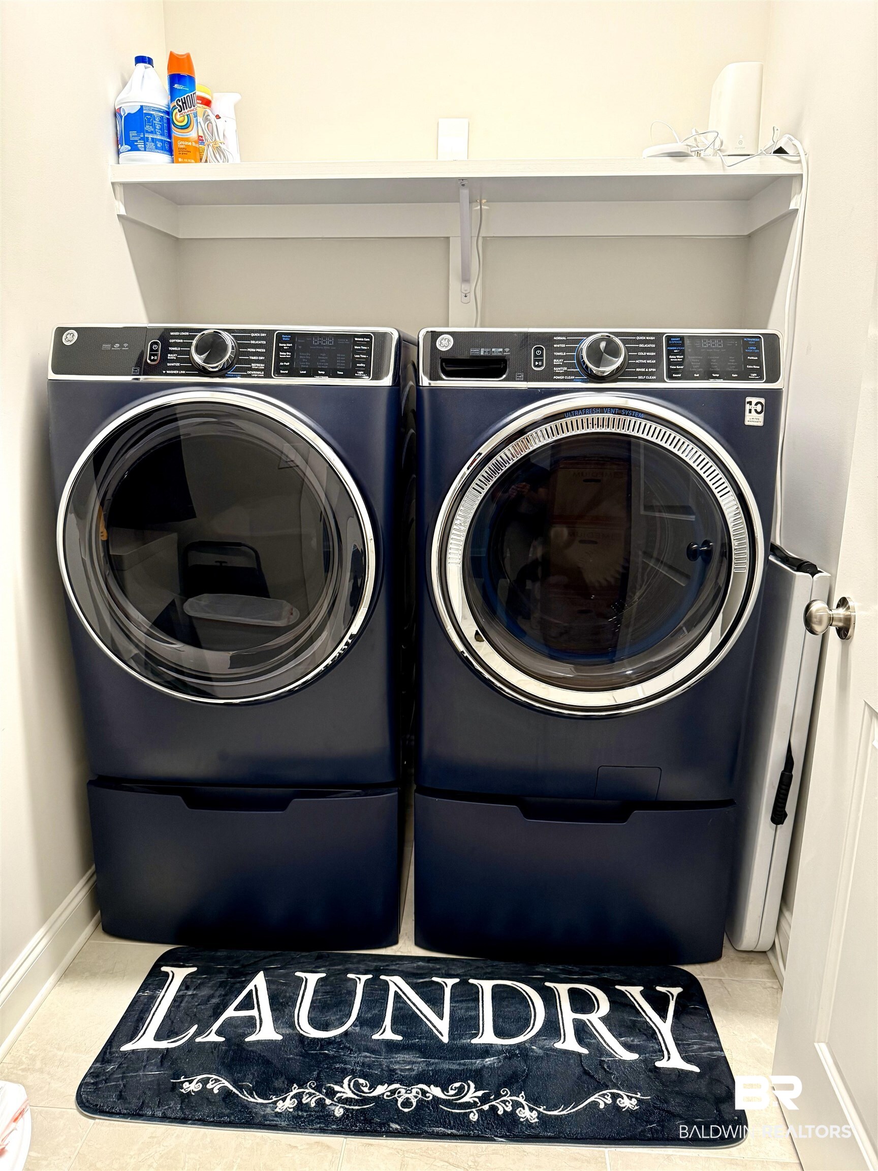 31748 Canopy Loop Spanish Fort, AL 36527 - Photo 11 of 22 Laundry area with washer and clothes dryer and tile patterned floors