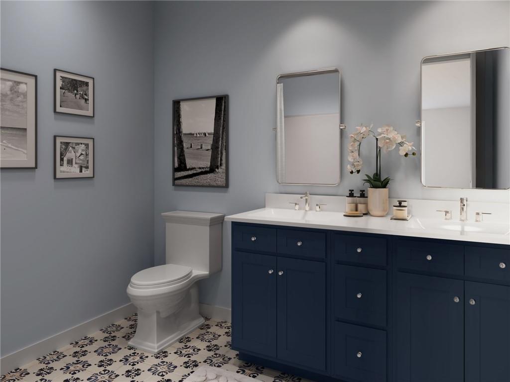 902 Reeb Way Cranberry Township, PA 16066 - Photo 22 of 31 a bathroom with a sink toilet and mirror