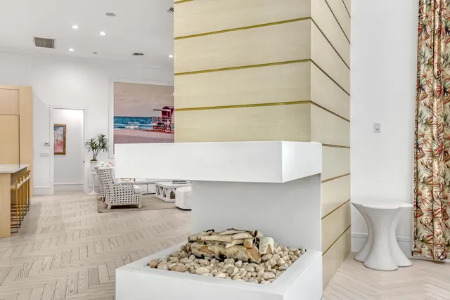 a bathroom with a sink a mirror and a shower