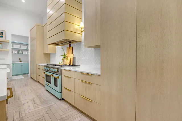 a view of walk in closet with clothes