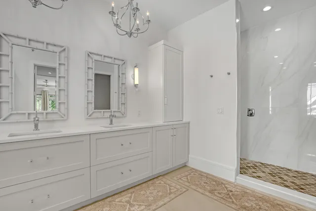 a aerial view of a house with swimming pool garden and patio