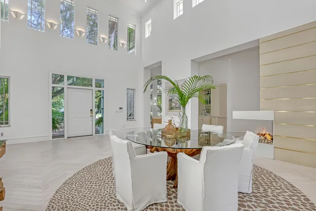 a living room with furniture and flat screen tv
