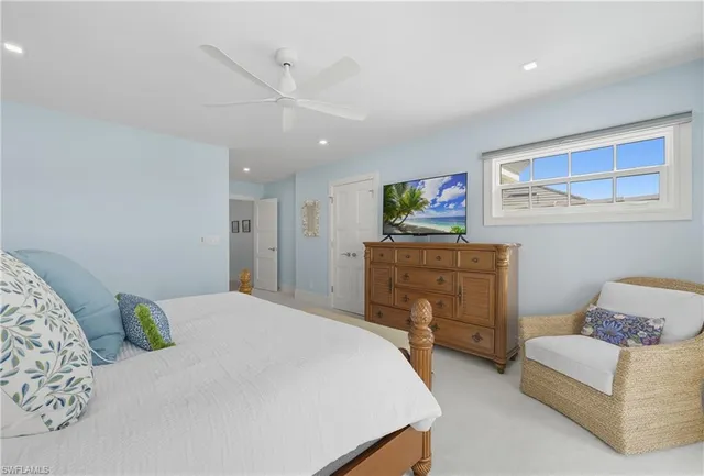 a bedroom with a bed and furniture