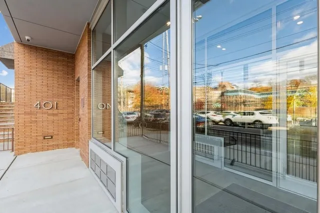 a view of a bathroom with a glass door