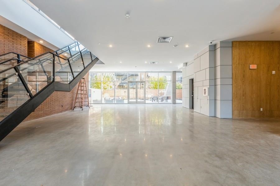 401 Jackson Street, Unit 507 Hoboken, NJ 07030 - Photo 3 of 29 a view of an entryway with wooden floor