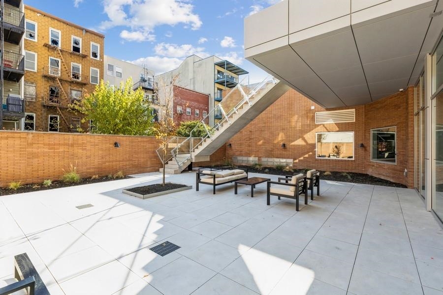 401 Jackson Street, Unit 507 Hoboken, NJ 07030 - Photo 6 of 29 a view of outdoor space with seating area
