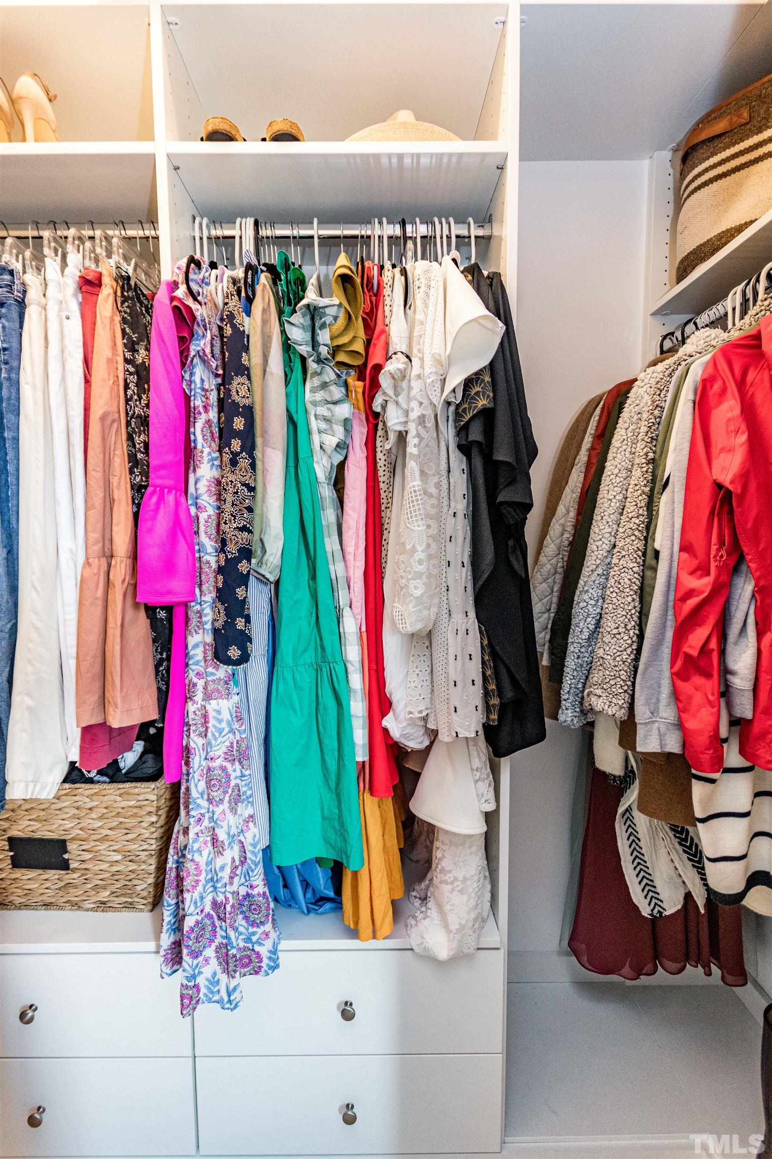 1417 Crafton Way Raleigh, NC 27607 - Photo 19 of 29 a view of walk in closet with clothes