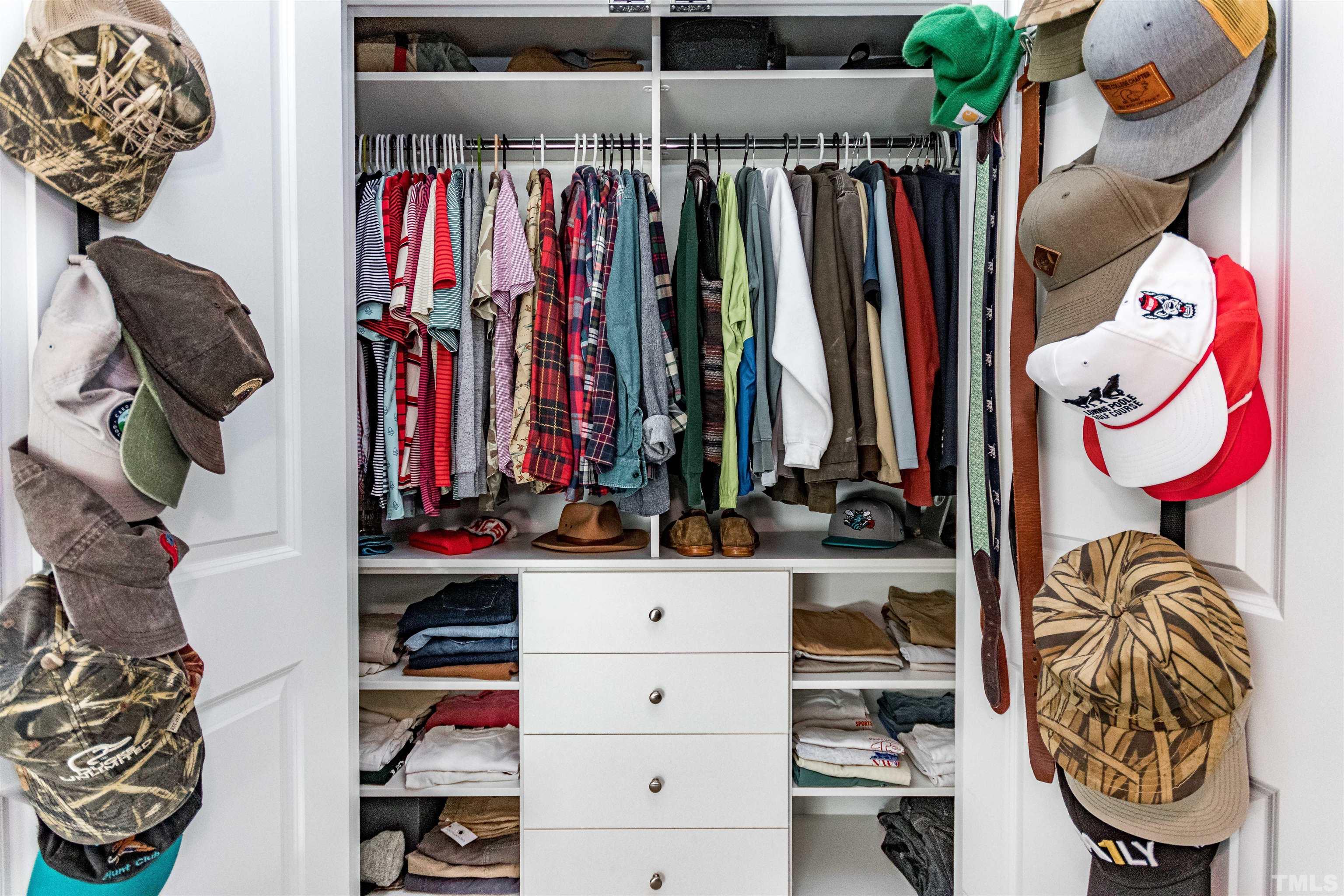 1417 Crafton Way Raleigh, NC 27607 - Photo 24 of 29 a view of walk in closet with clothes and shoes