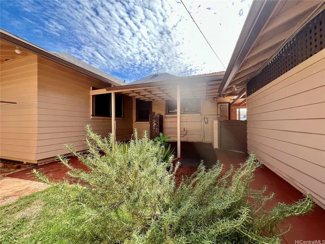 a view of a backyard with plants
